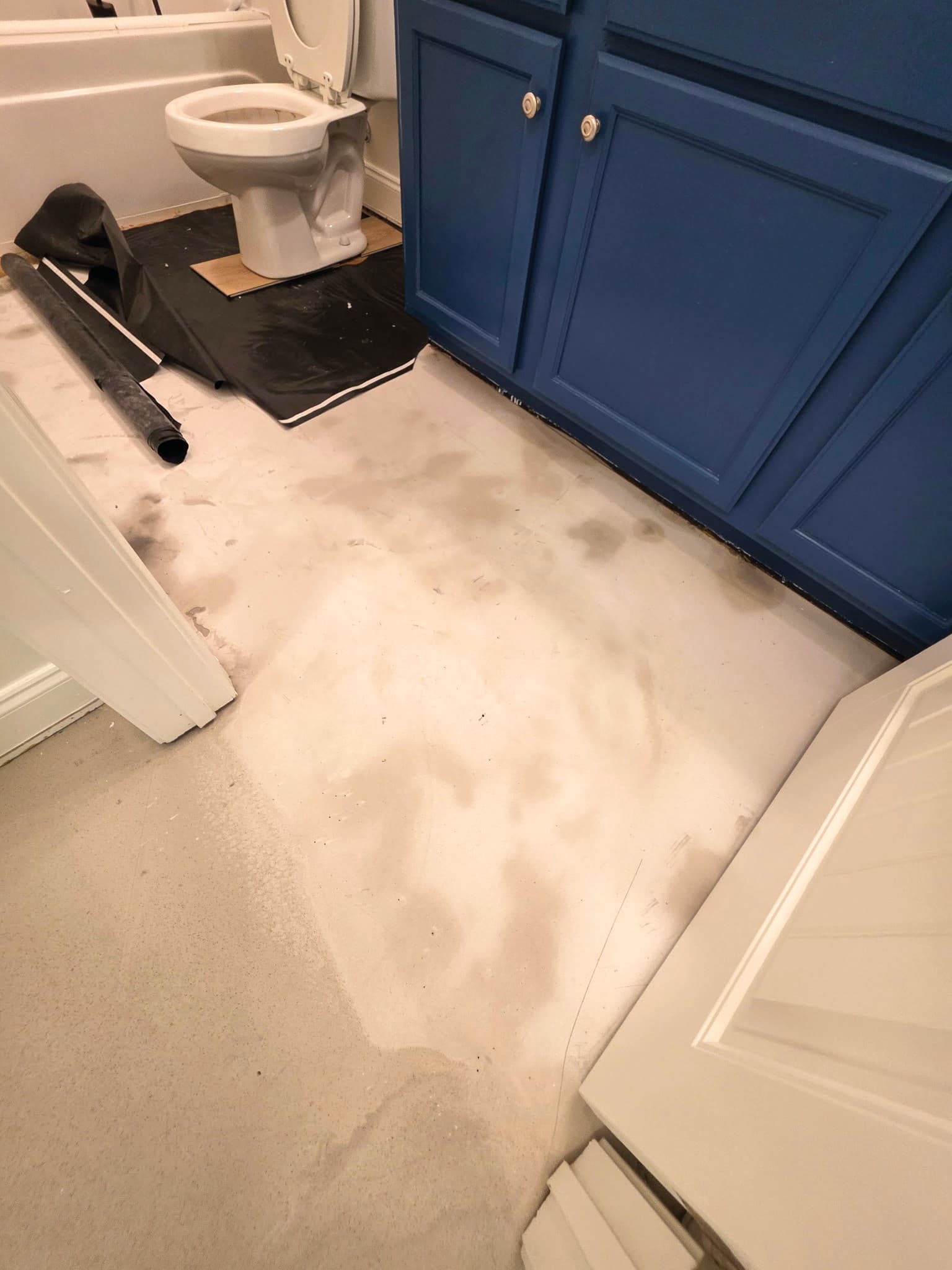 Bathroom flooring renovation tile detail.