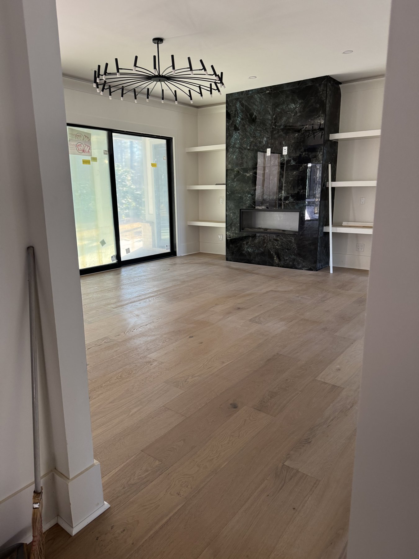 Wide-plank white oak hardwood in an open Atlanta great room.